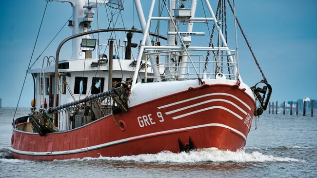 A fishing vessel on water.