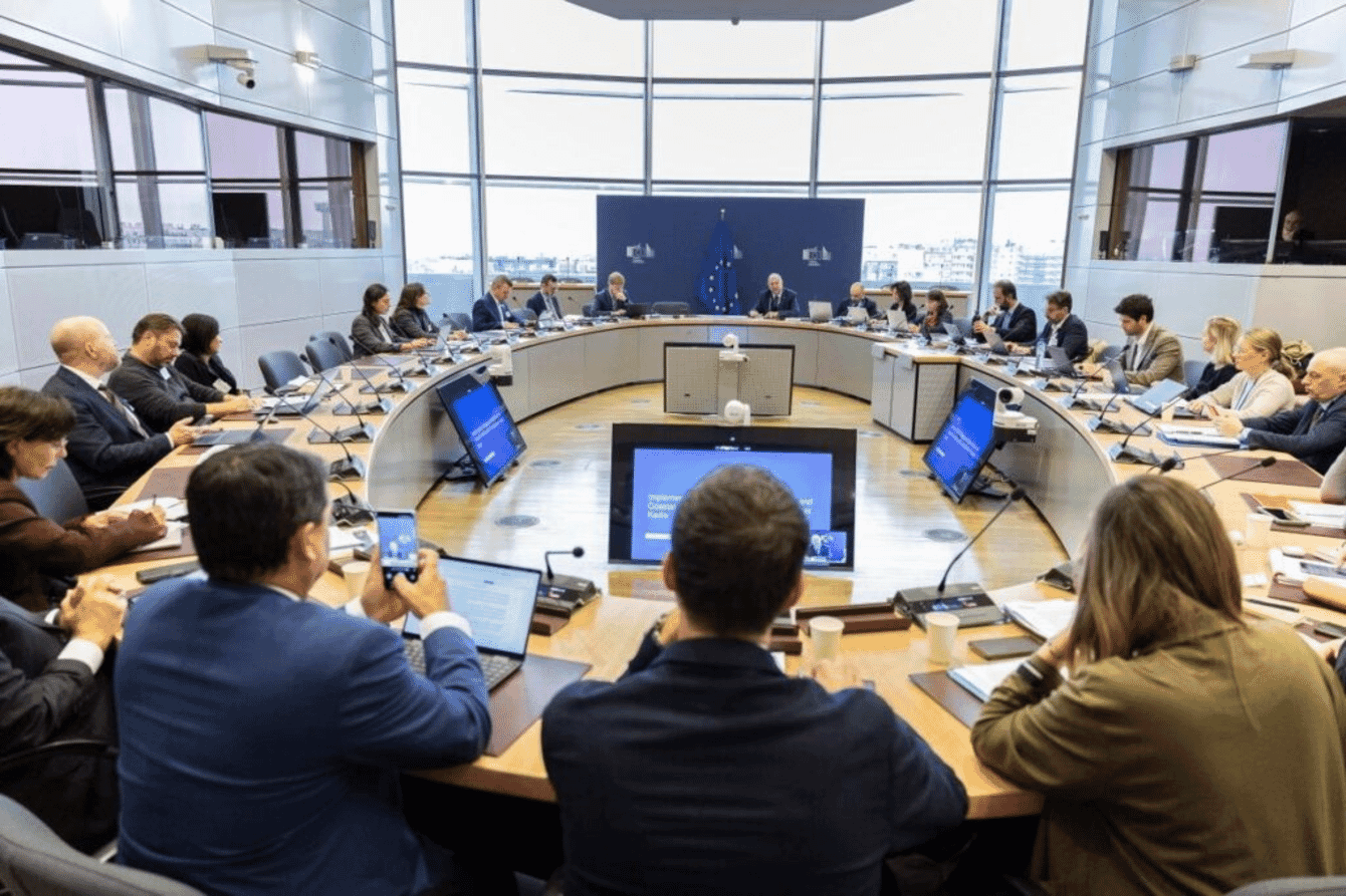 A group of people around a table.